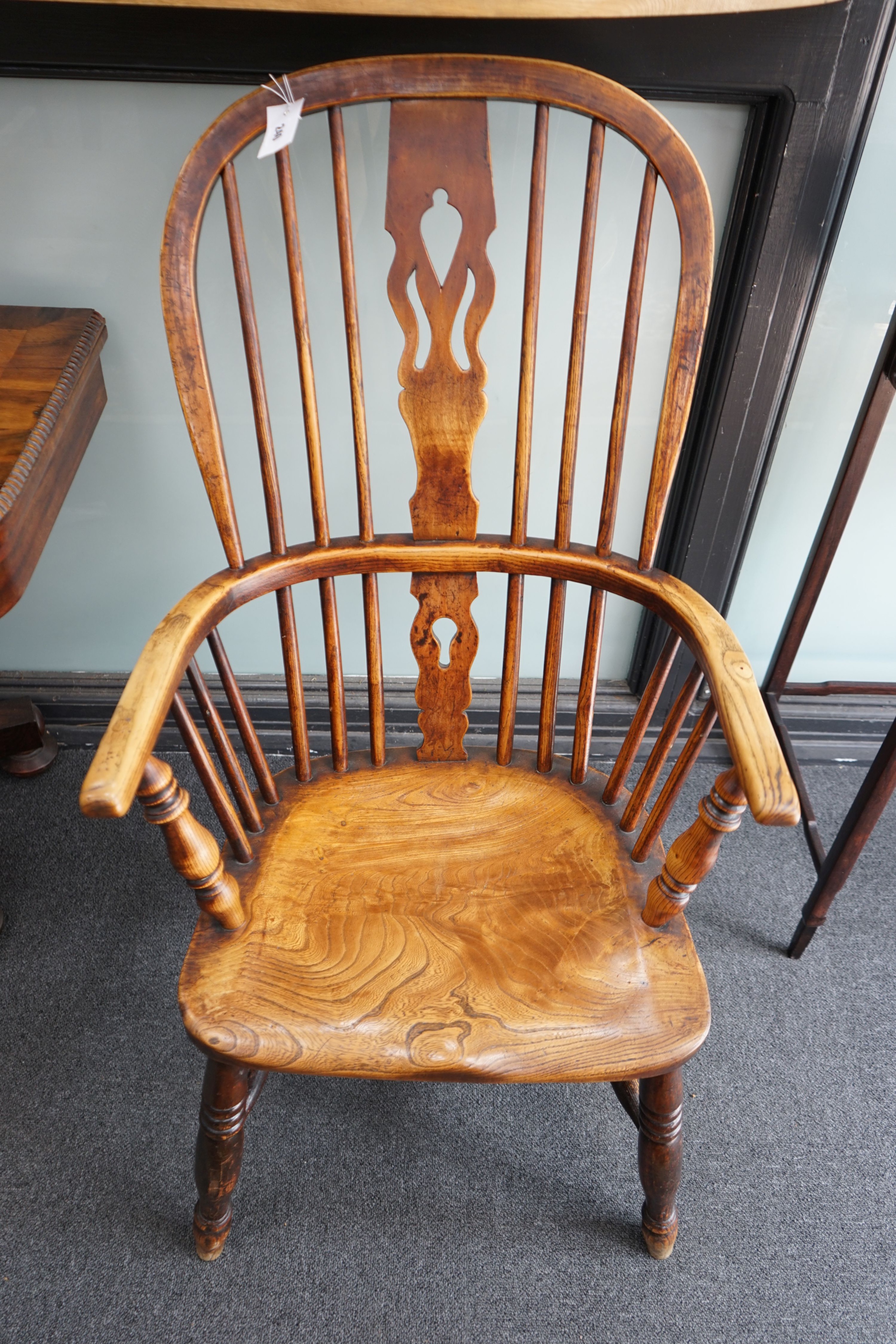 A Victorian elm and beech Windsor armchair, with fruit wood splat, width 56cm depth 40cm height 102cm